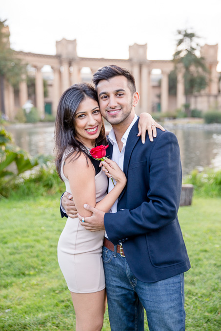 beatiful and bright engagement photo in front of palace of fine arts
