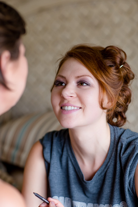bride having her makeup done