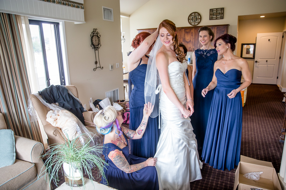 touching the bride up before she walks down the aisle