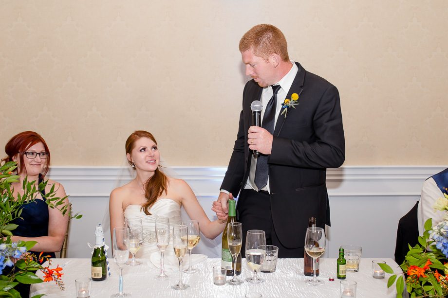 groom giving a touching speech to his wife