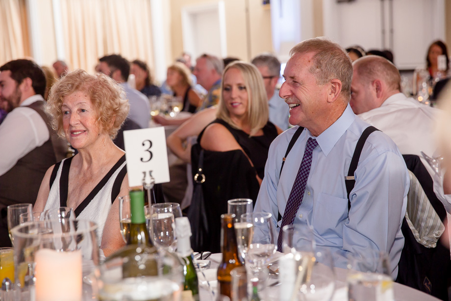 wedding guests enjoying the speeches