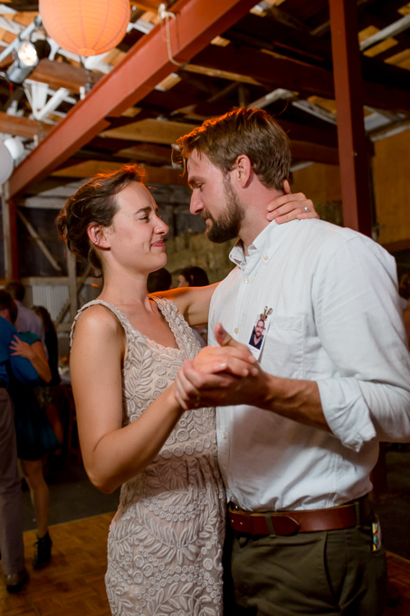 wedding guests dancing together during reception