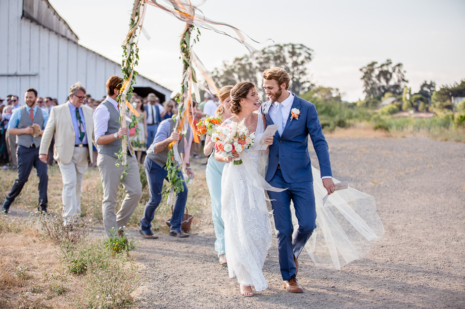 sweet candid photo during a wedding parade - Bay Area journalistic wedding photographer
