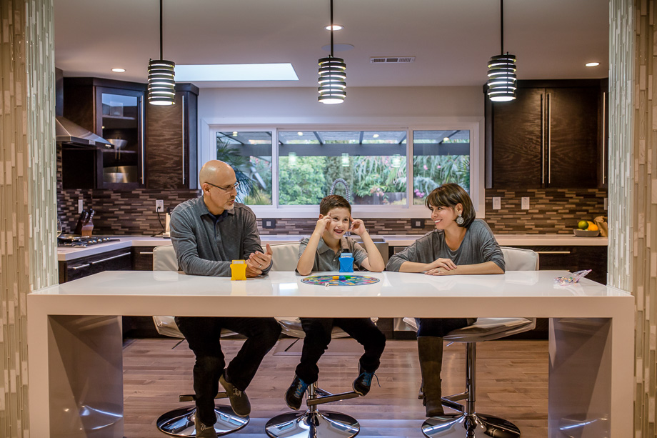 family sitting at kitchen table