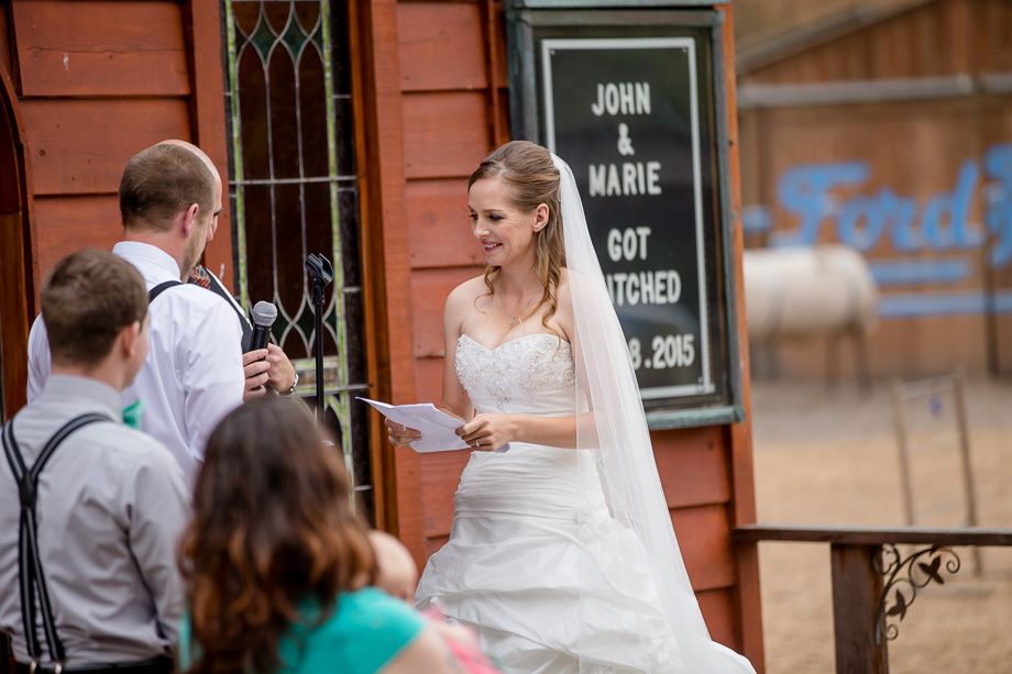 bride reading her handwritten vows