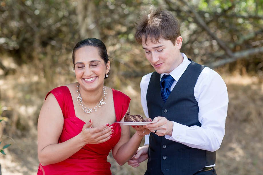 sweet moment of feeding each other the wedding cake