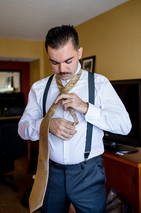 groom getting ready at the Courtyard Larkspur
