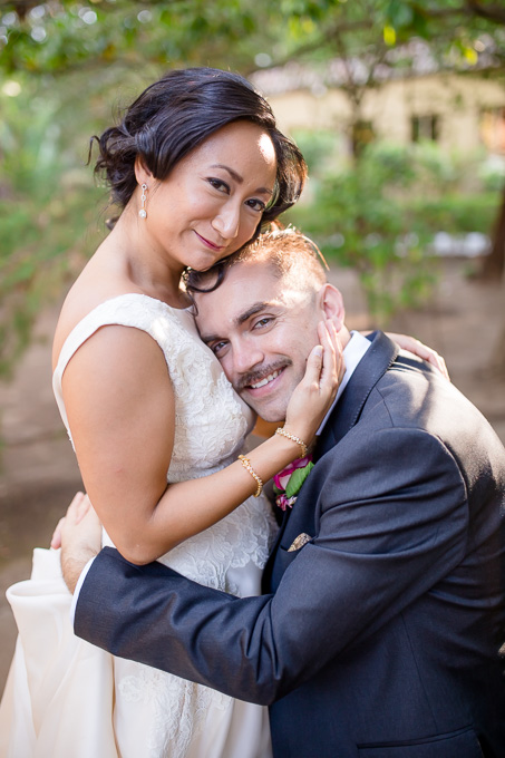 groom resting head on bride's chest