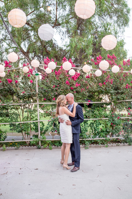 wedding photo under paper lanterns outdoor