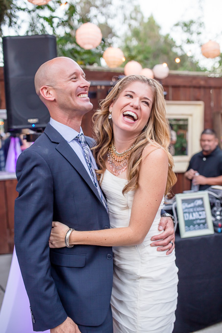 bride and groom laughing