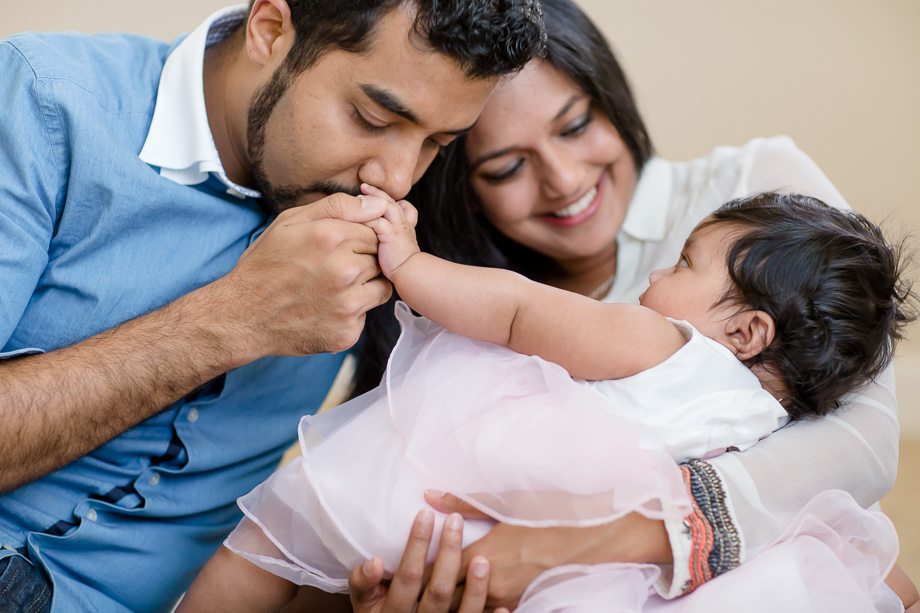 a lovely moment of a family of three