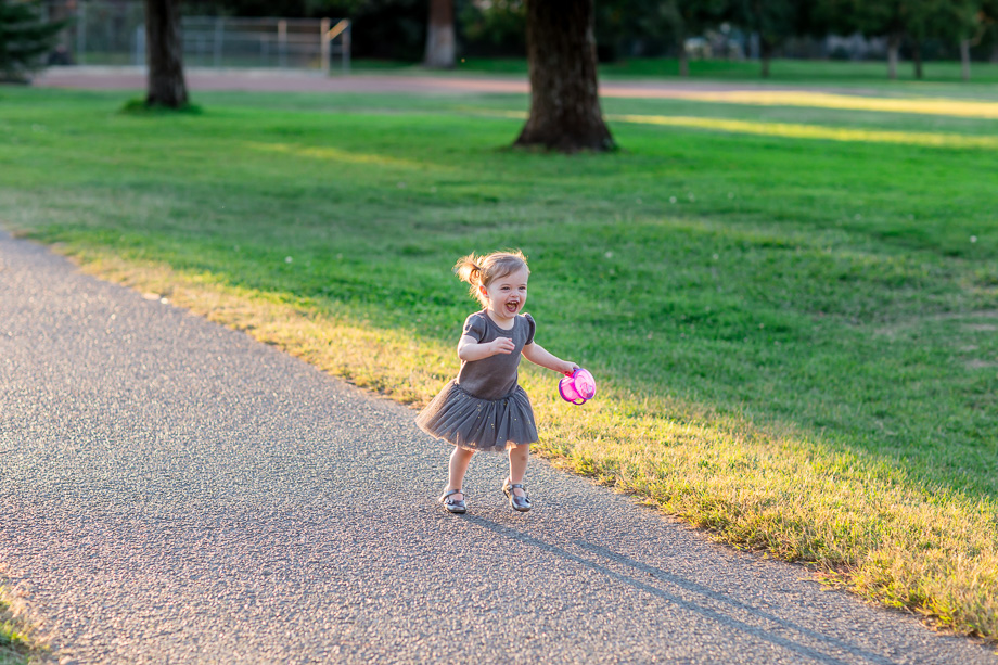 happy running baby girl