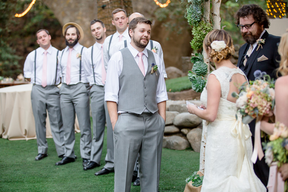 groom listening to bride's vows