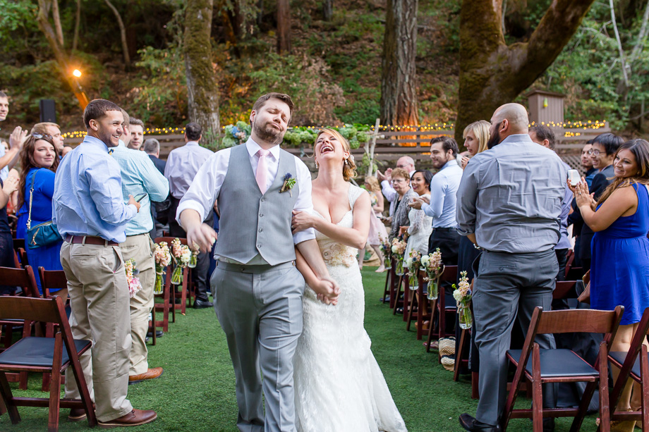 happy funny wedding ceremony exit photo