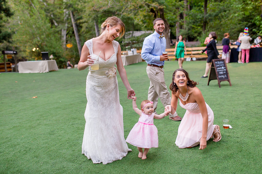 bride with baby at wedding