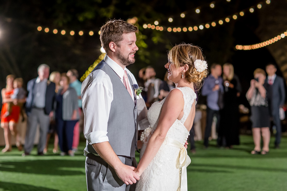 bride and groom first dance in the dark