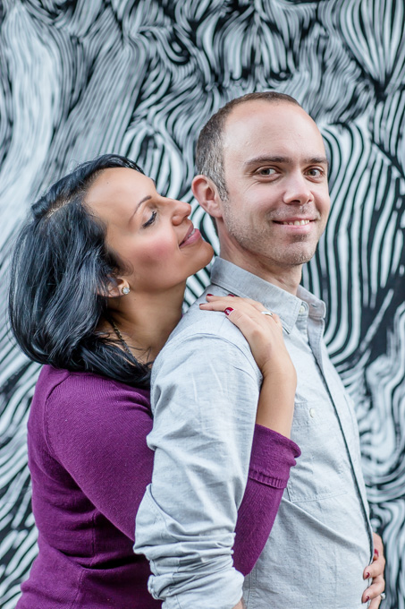 engagement photo in front of cool mural