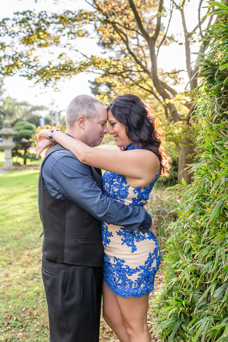 sunny engagement photo near Japanese garden