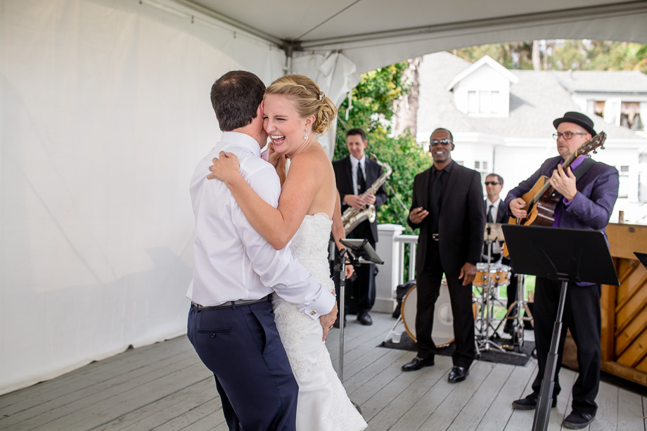 bride laughing during first dance