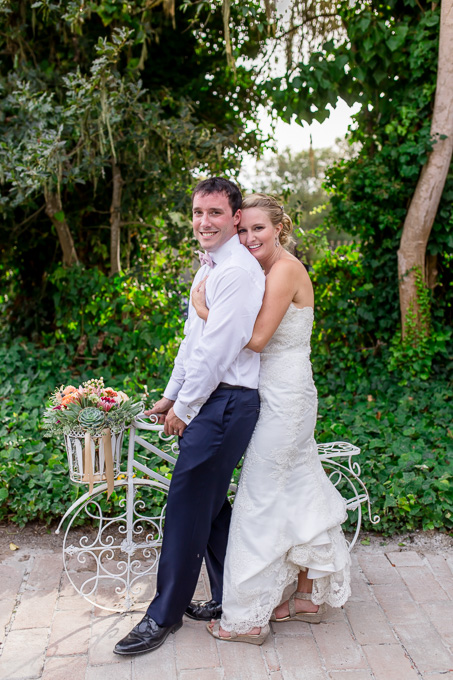 bride and groom on bicycle