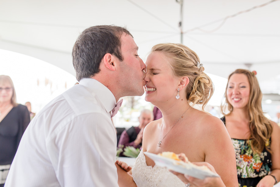 groom kissing bride's nose