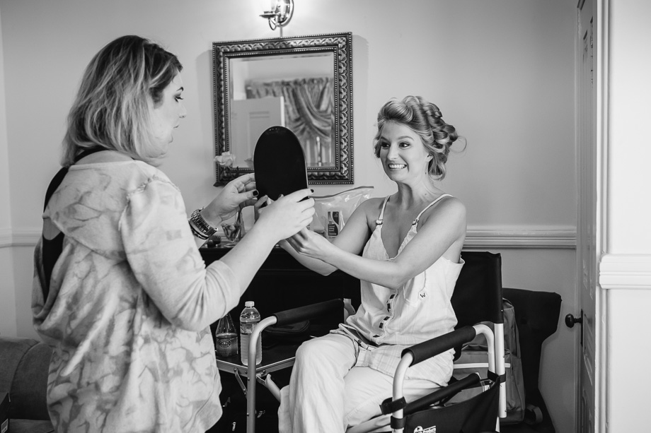capitola wedding photographer - bride looking at herself in mirror