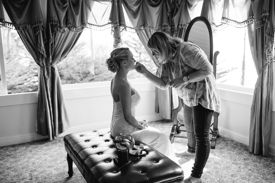 final bride touchups on makeup