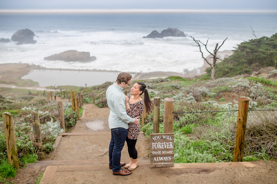stunning save the date engagement photo at sutro baths - presidio engagement photographer