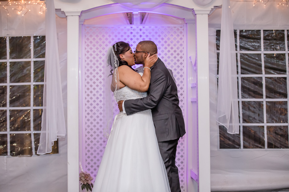 first kiss with purple uplighting