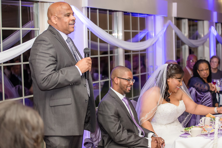 father giving speech during wedding
