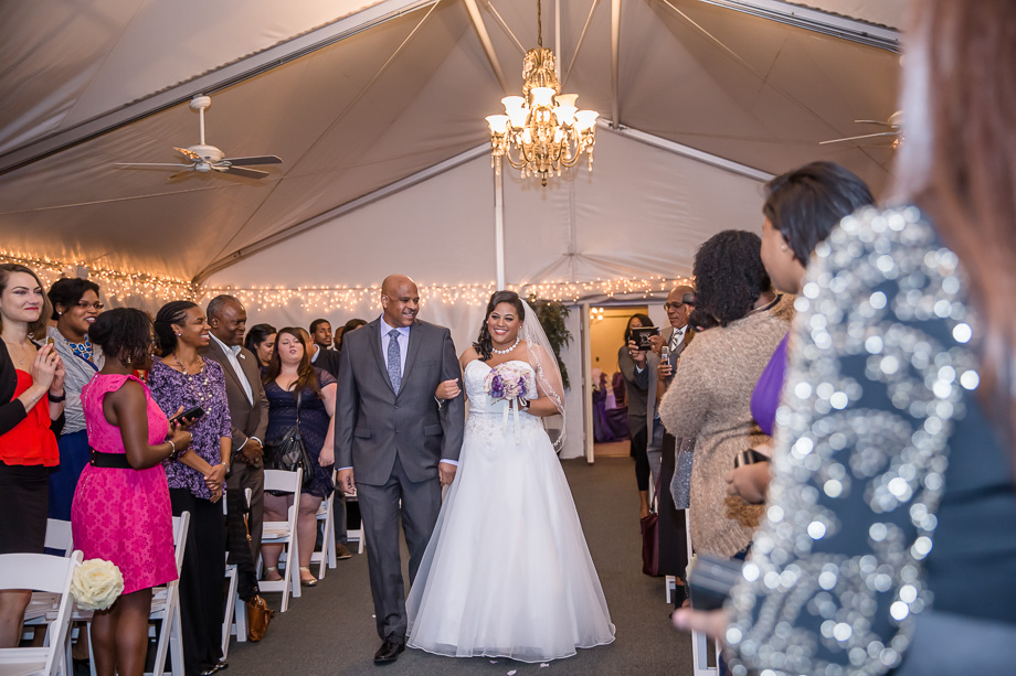wedding ceremony under the wedding tent at grandview pavilion