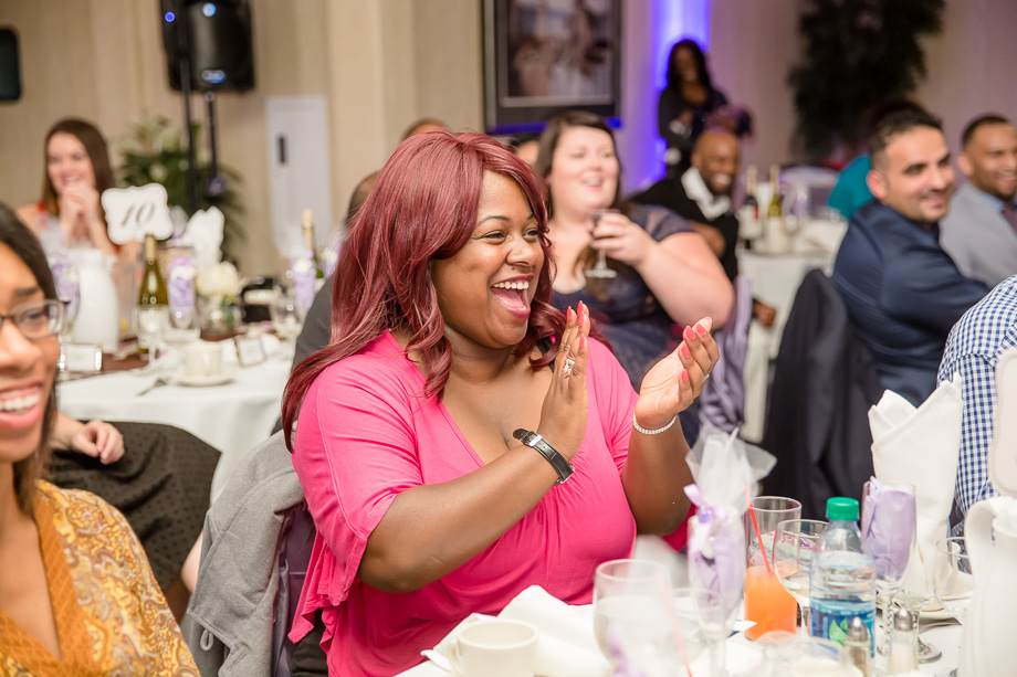 wedding guest clapping for wedding toast