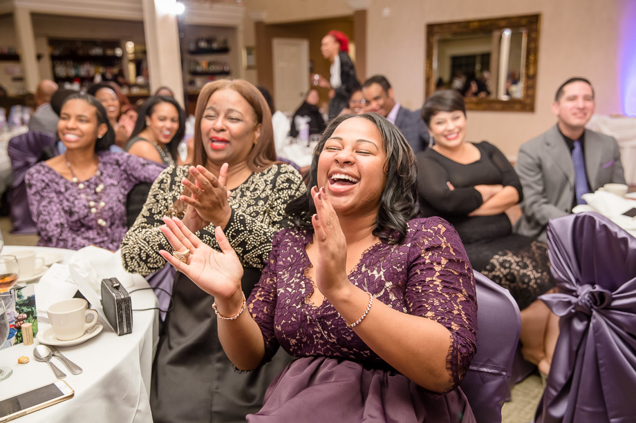 guests laughing at funny wedding toast