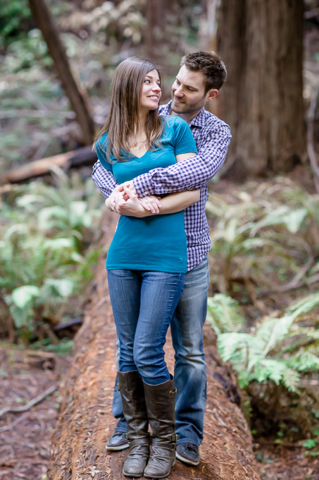 engagement photo on a fallen log