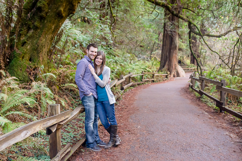 engagement photo on hiking trail in Muir Woods