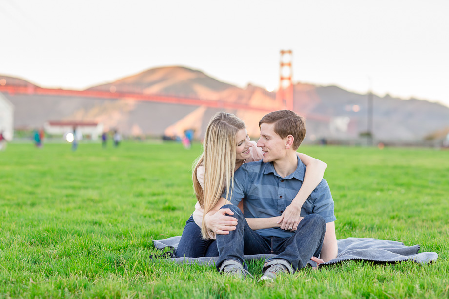 romantic san francisco engagement photo in front of the golden gate bridge