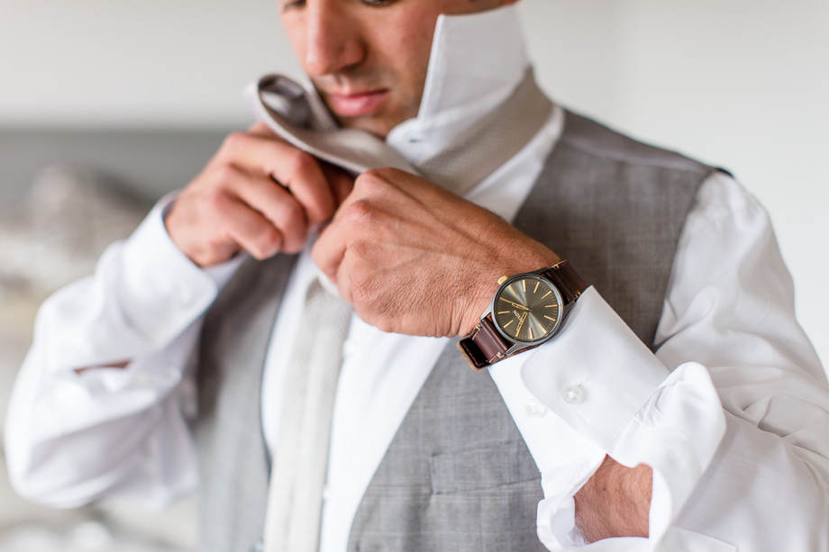 groom getting ready at a private property in Half Moon Bay