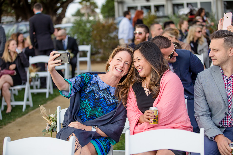 wedding guests taking a selfie