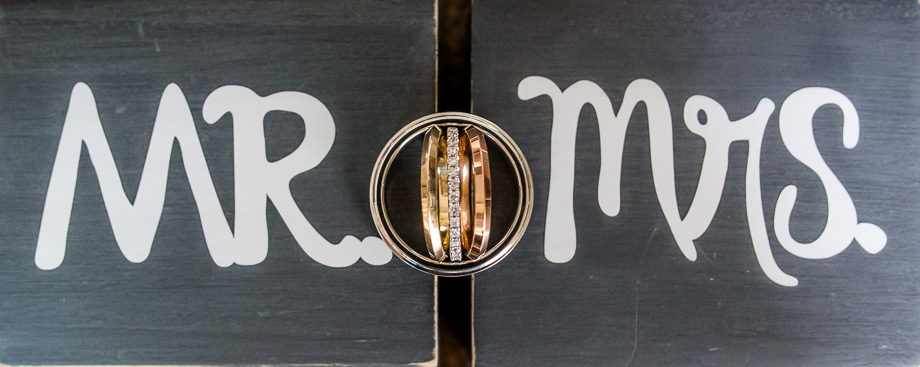 Mr and Mrs boxes with wedding rings and engagement ring