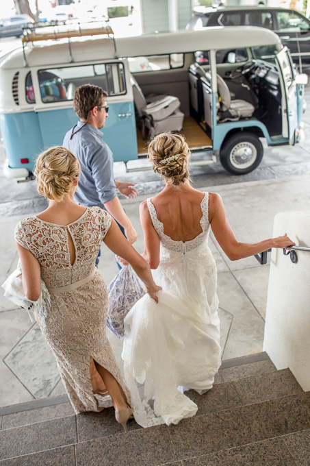 bride and her sister getting ready for wedding ceremony