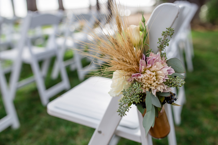 beautiful wedding aisle floral arrangement