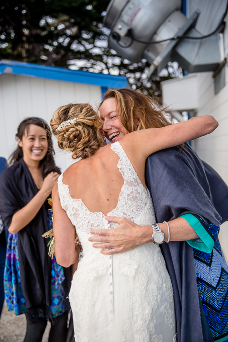 bride hugging guest