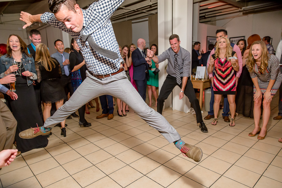 Mavericks Center reception party - wedding guest owning the dance floor