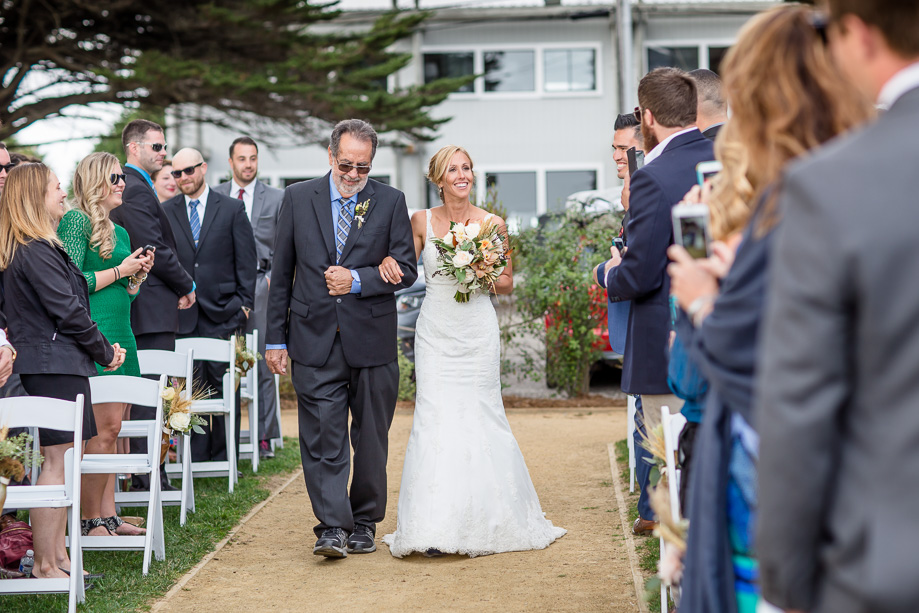 bride escorted by her father