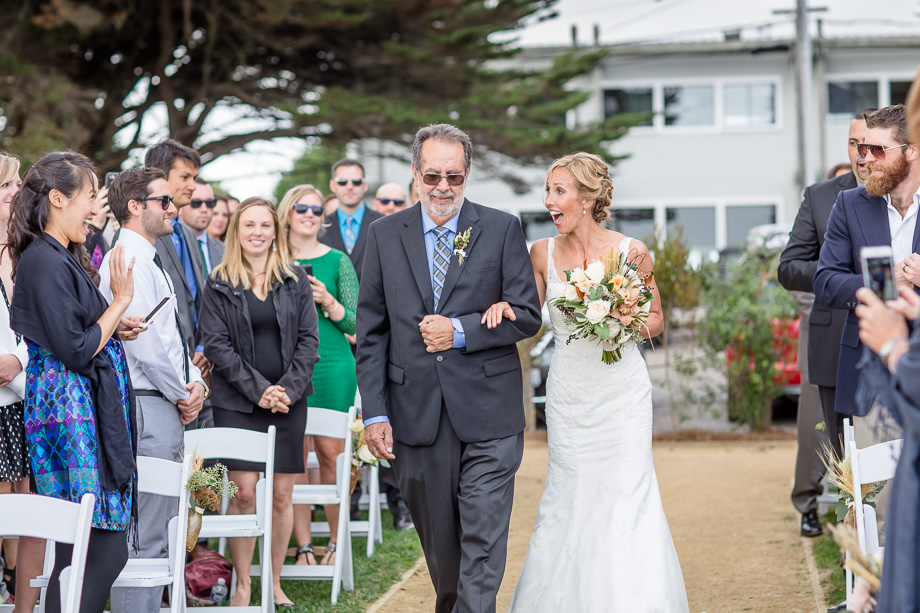 bride walking down the aisle - HMB Mavericks wedding