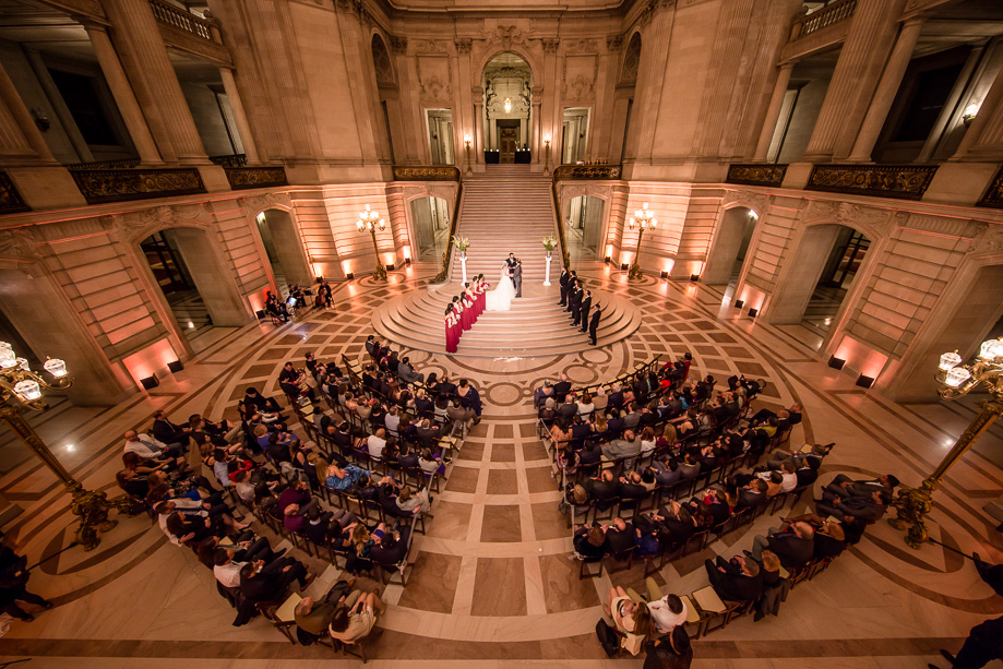 wedding ceremony at the grand staircase at San Francisco City Hall