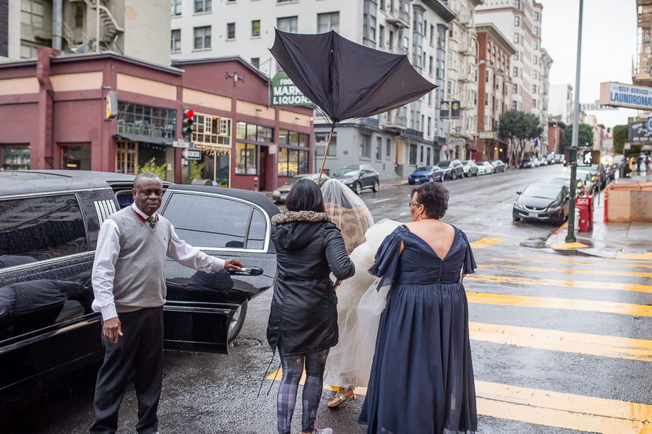 a hilarious candid moment as the bride stepping out of the WorldMark SF