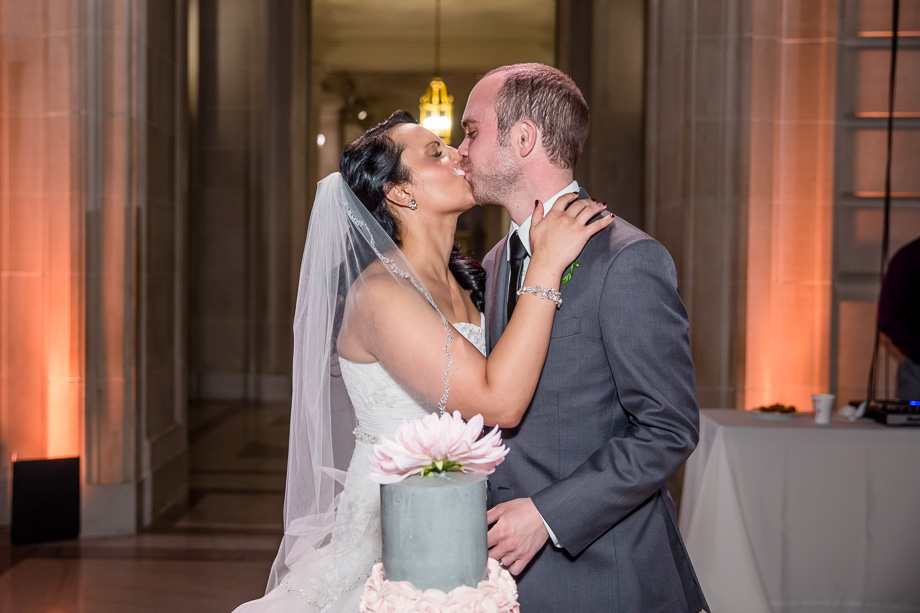 sweet kiss after the cake cutting