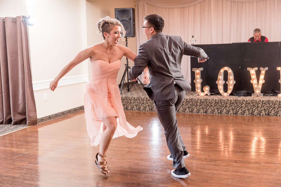 groom dancing with his sister - california candid wedding photographer