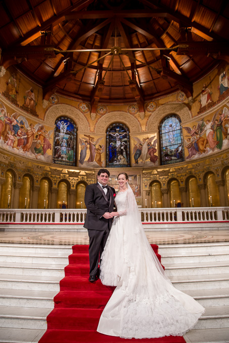 wedding couple on steps of Stanford church